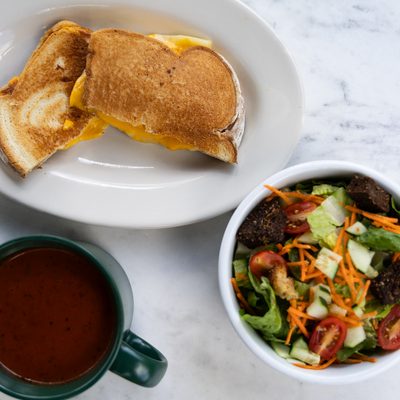 Grilled cheese with tomato basil soup and a side salad.